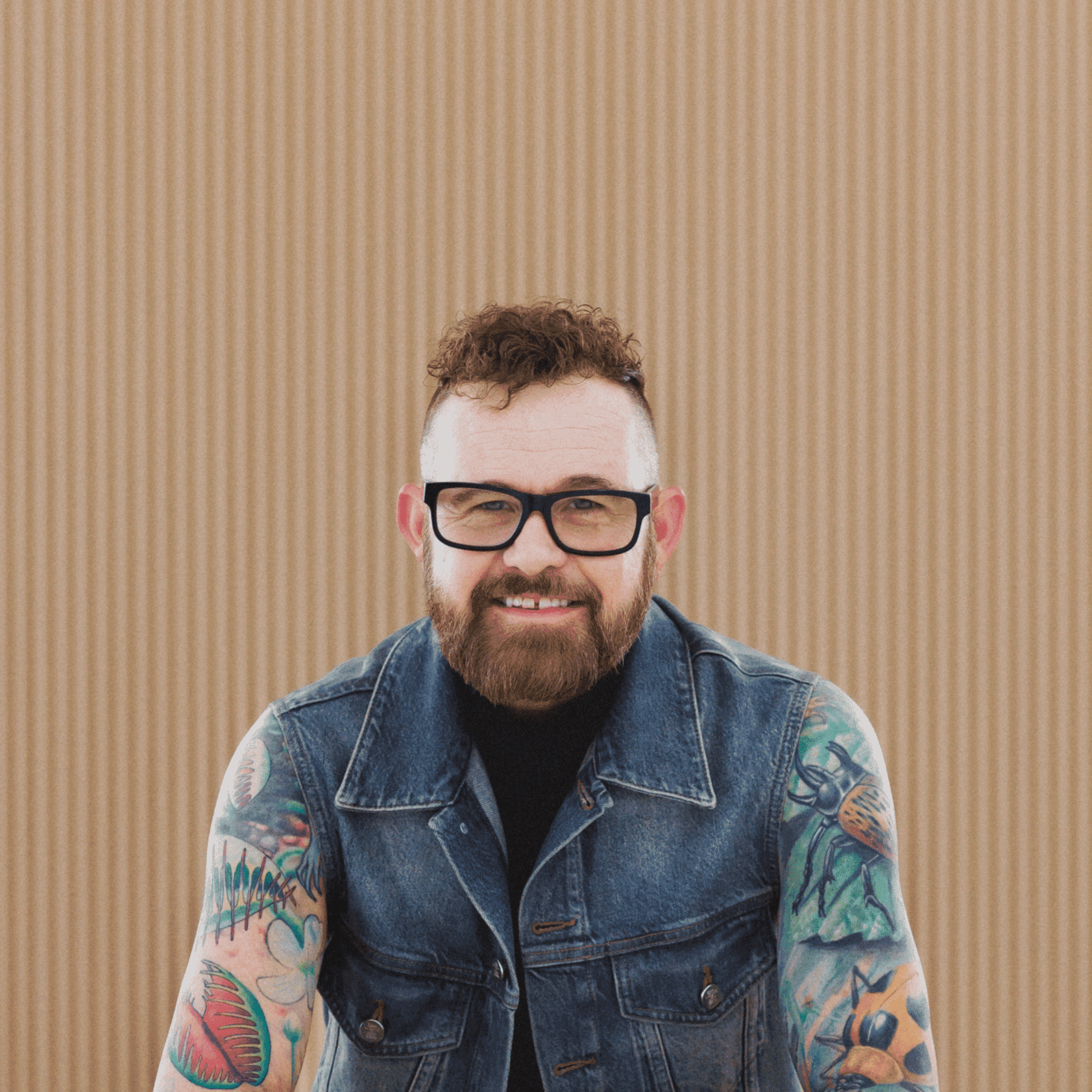 Portrait of Trey Watts, a professional stylist at Salon Wave, showcasing their expertise and style.