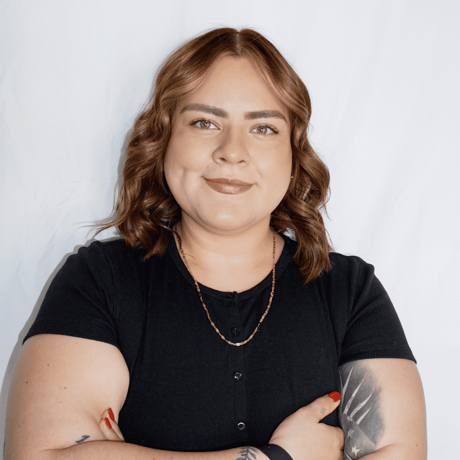 Portrait of Daniela Hernandez, a professional stylist at Salon Wave, showcasing their expertise and style.